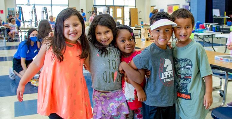 smiling children posing together